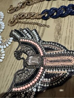 Assortment of 3 necklaces (one with matching earrings)